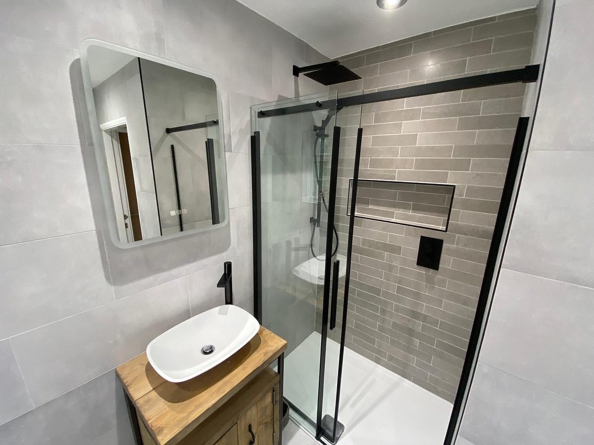 Matt black bathroom taps really set this bathroom in Otley apart