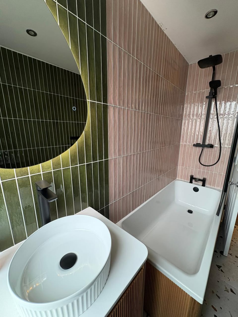 Modern pink and green tiled bathroom with tiled floor Otley West Yorkshire