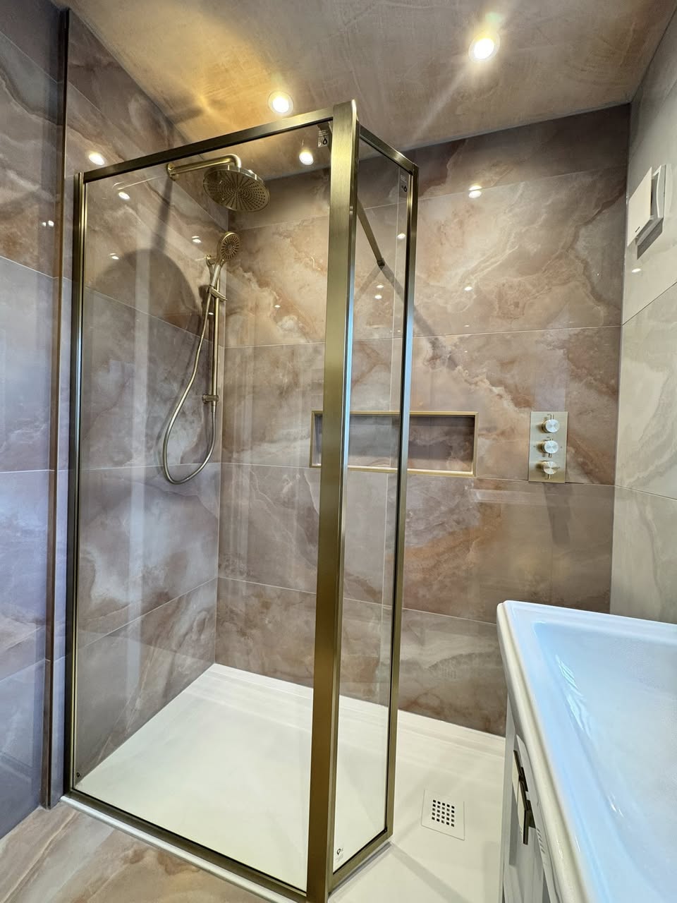 SR Kitchens and bathrooms peach and gold bathroom Otley