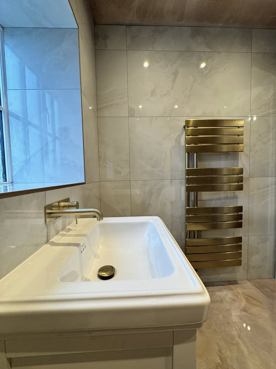 SR Kitchens and bathrooms peach and gold bathroom Otley