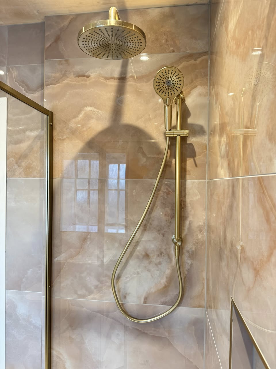 SR Kitchens and bathrooms peach and gold bathroom Otley