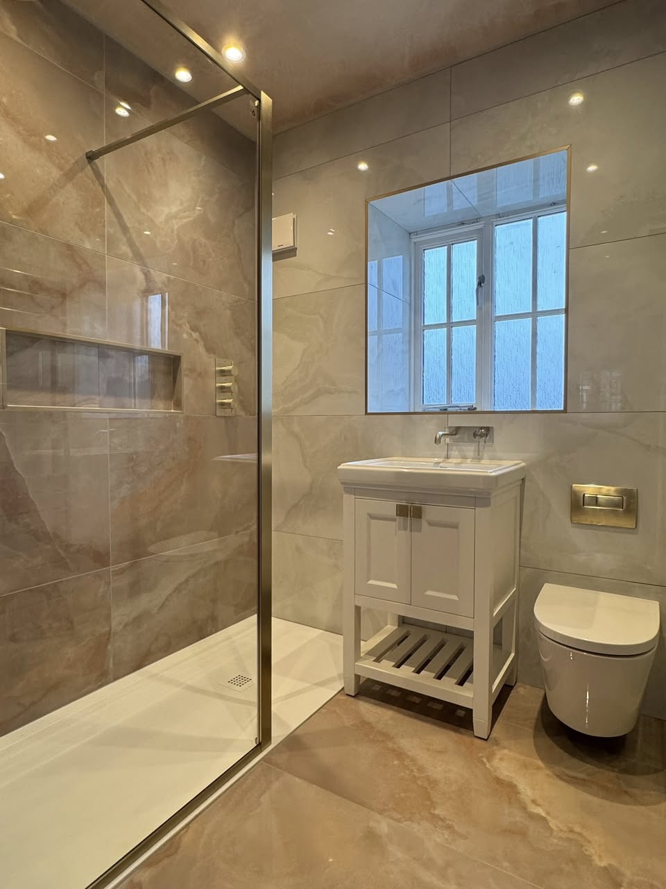 SR Kitchens and bathrooms peach and gold bathroom Otley