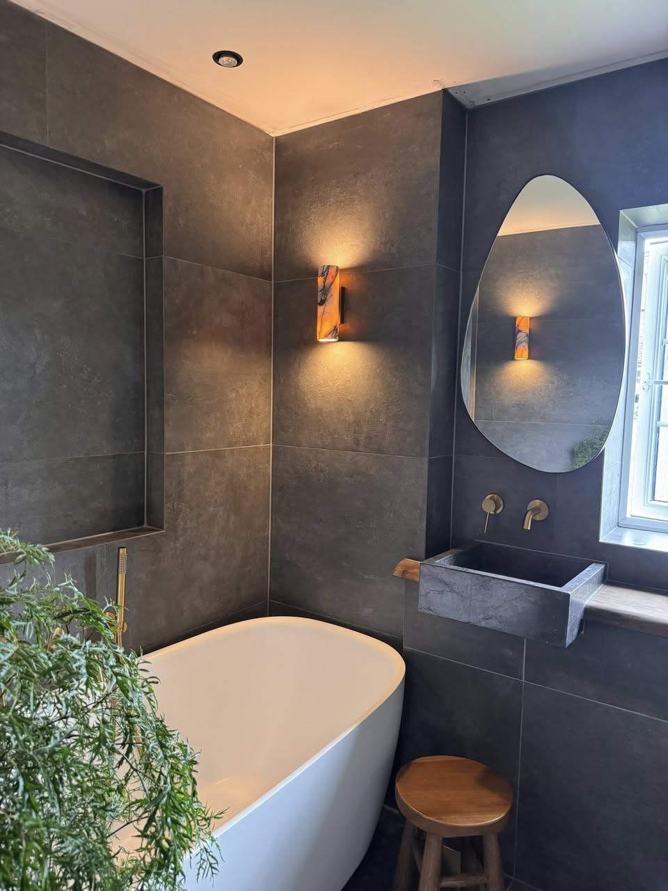 Bathroom sanctuary SR Kitchen and Bathrooms Otley with grey bathroom tiles for the spa type bathroom