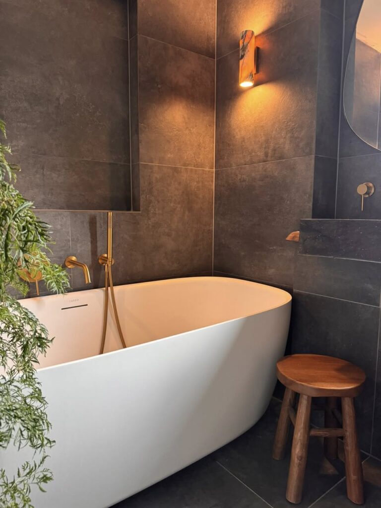 Bathroom sanctuary SR Kitchen and Bathrooms Otley with grey bathroom tiles for the spa type bathroom