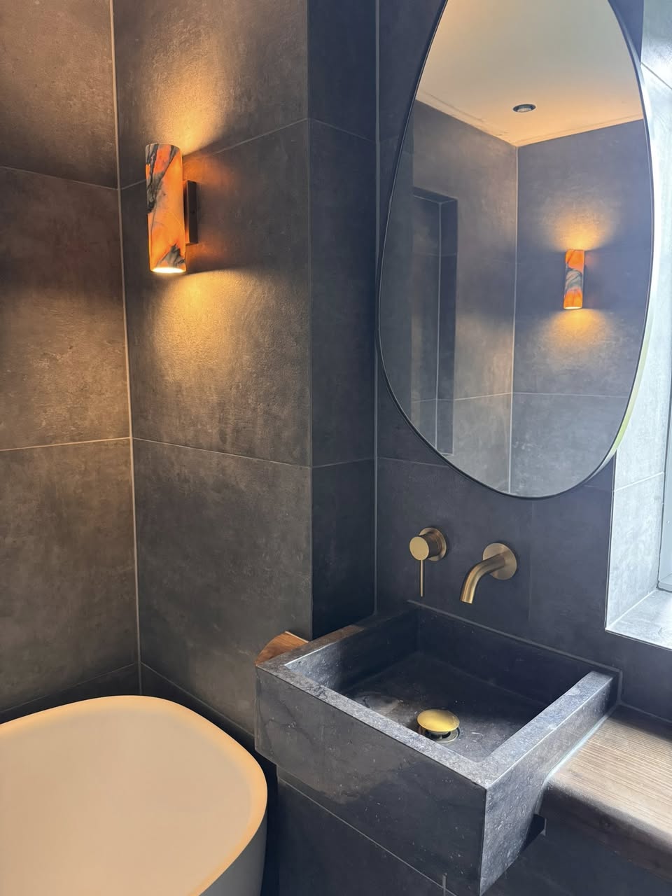 Bathroom sanctuary SR Kitchen and Bathrooms Otley with grey bathroom tiles for the spa type bathroom