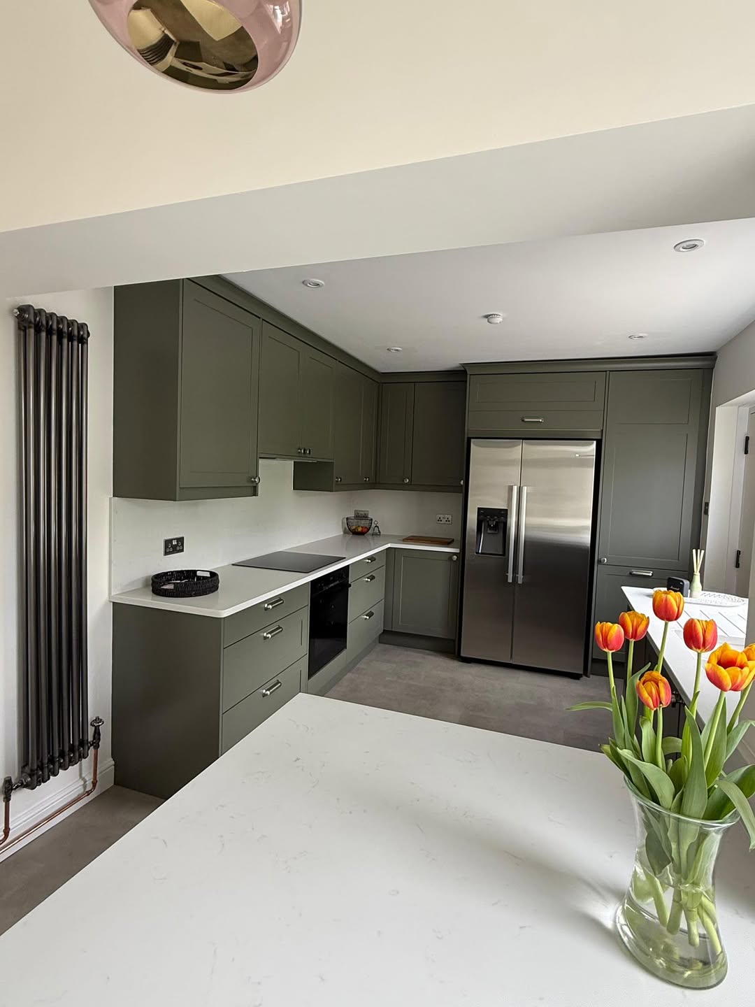 Kitchen renovation Skipton. Green Kitchen with white granite worktop
