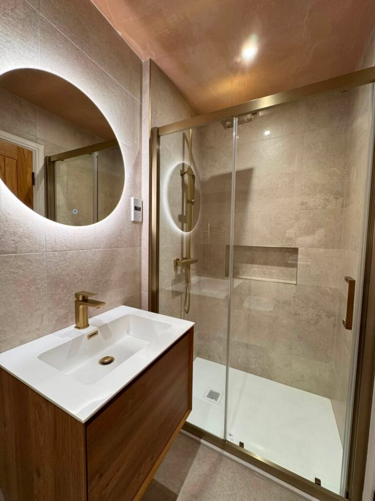Modern Salmon pink and gold bathroom shower room renovation Otley