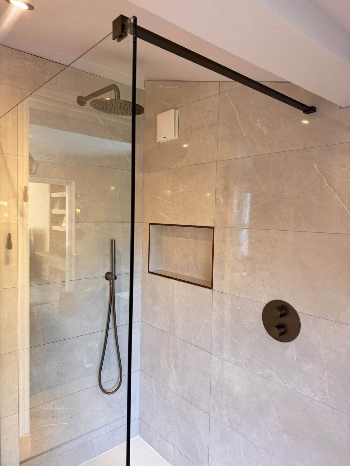bronze finish bathroom with walk in shower Otley