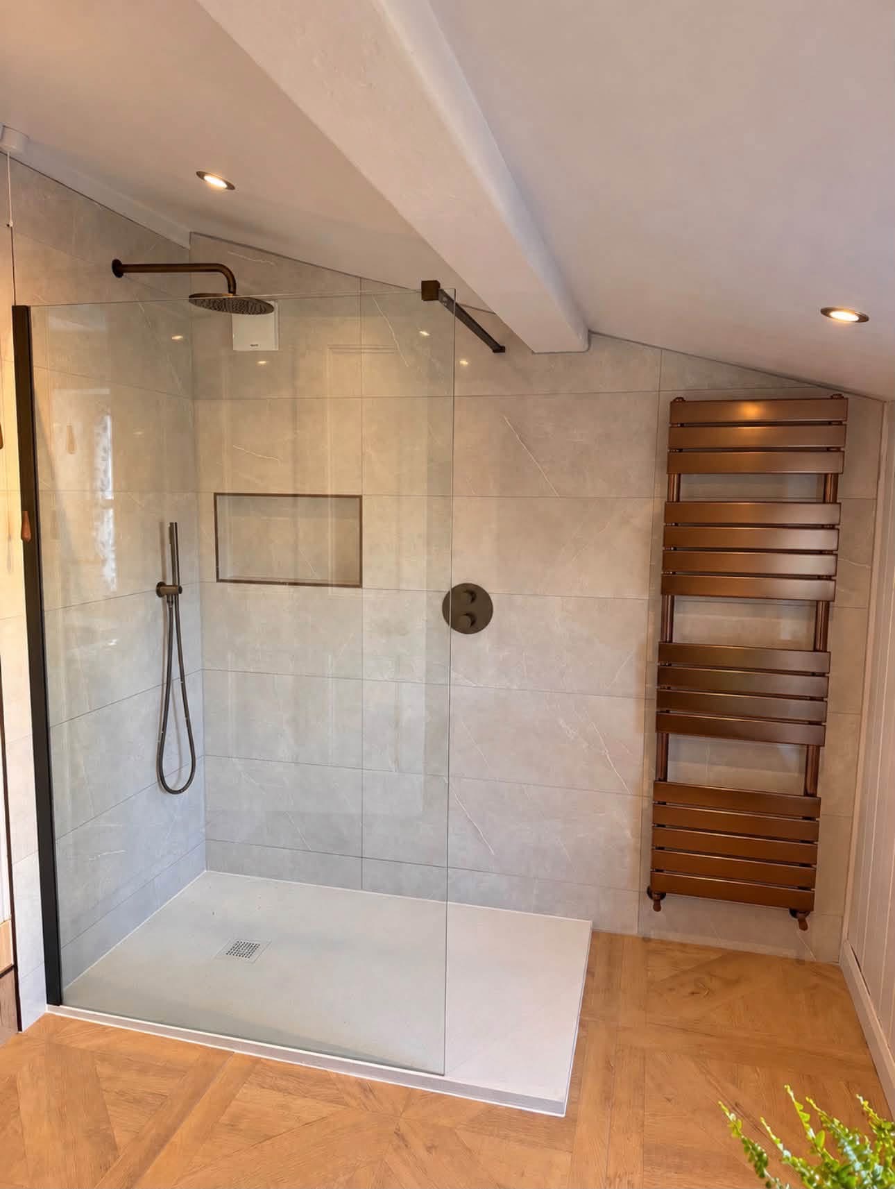 bronze finish bathroom with walk in shower Otley